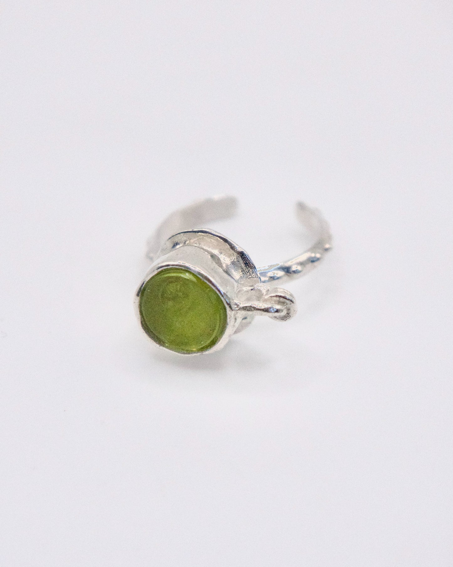 a matcha cup made of 935 silver and green peridot, amemori