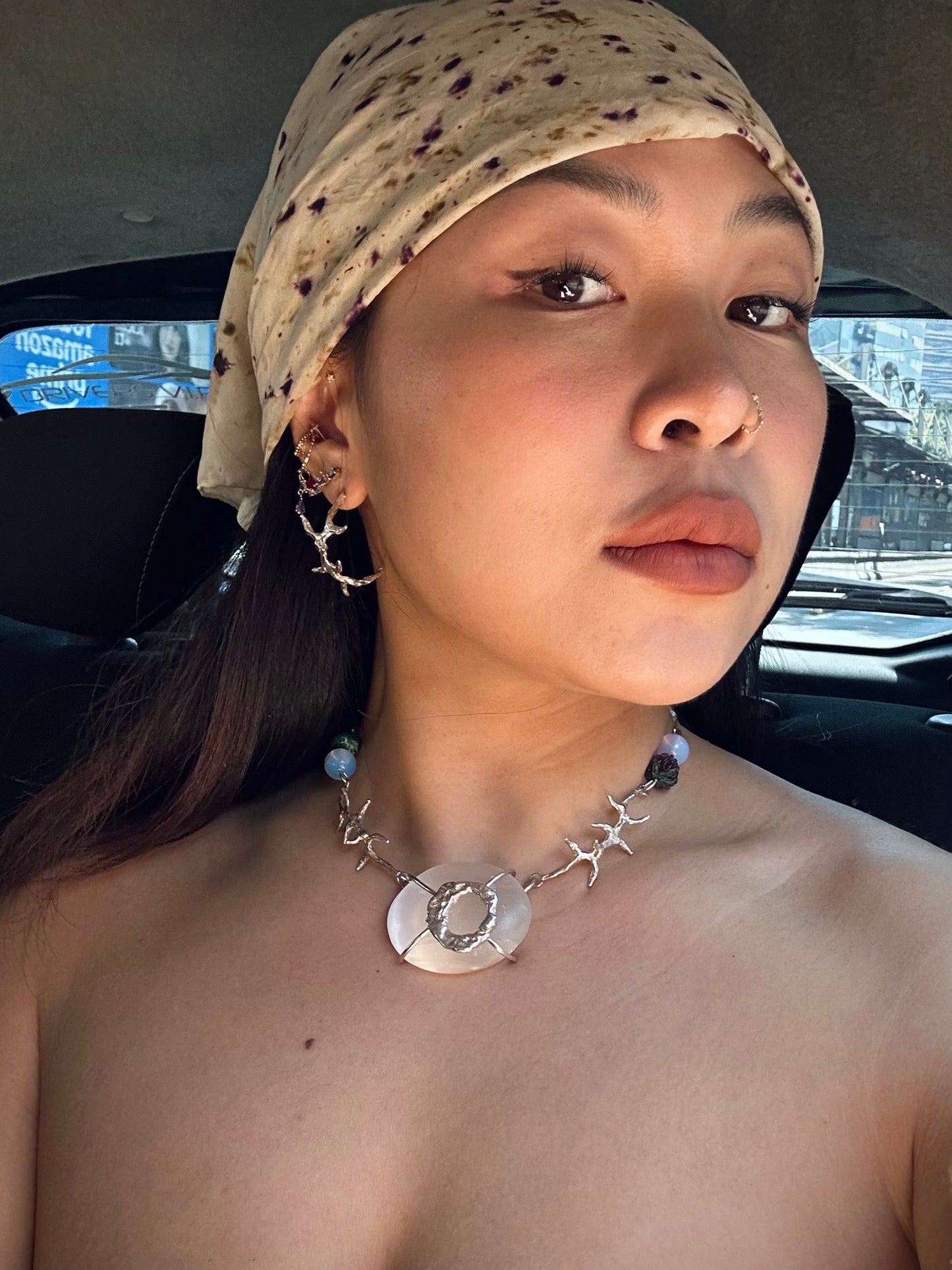 woman wearing unique hoops earrings, daily ootd style