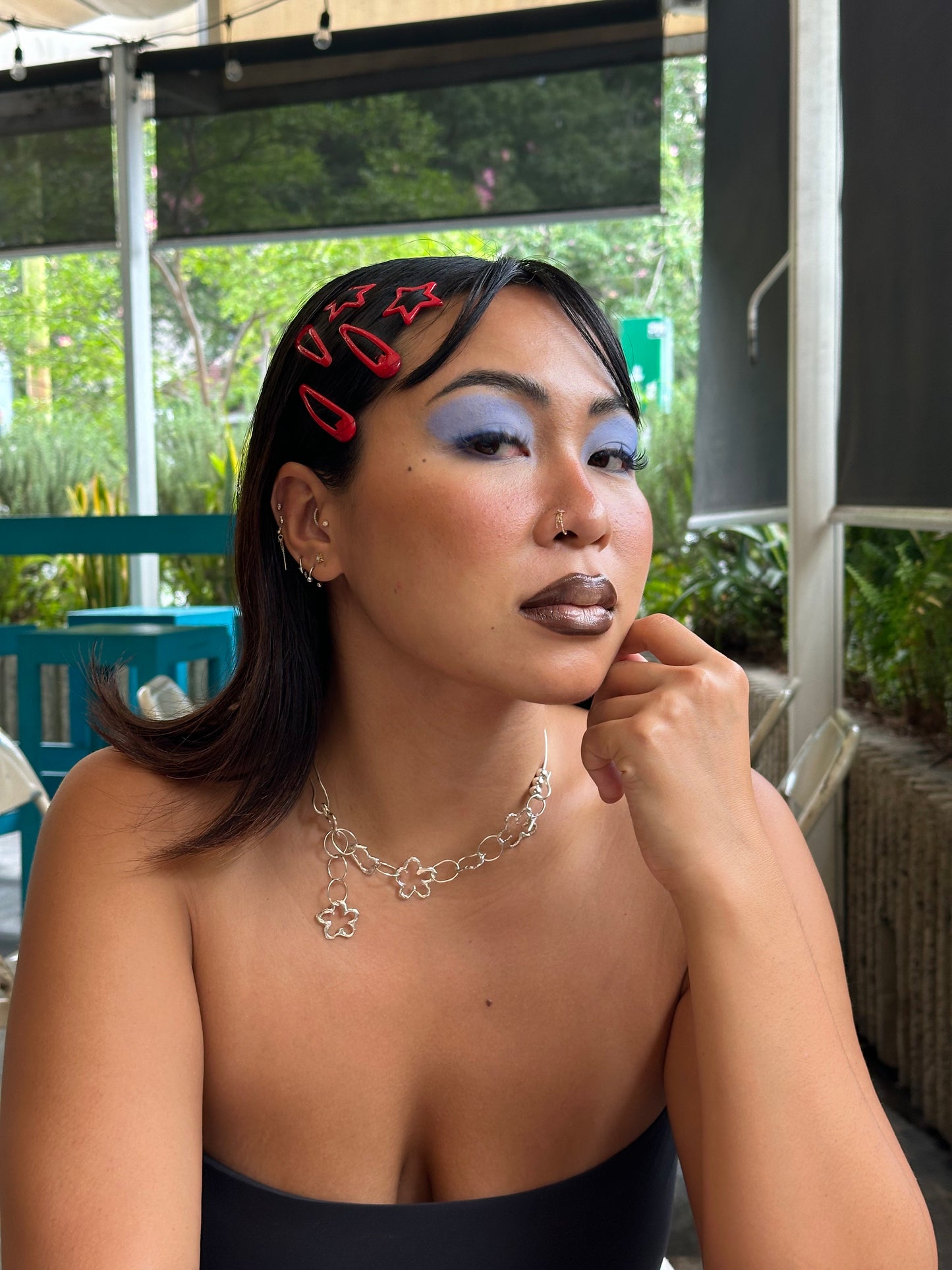 woman wearing the silver necklace, adjustable and chic