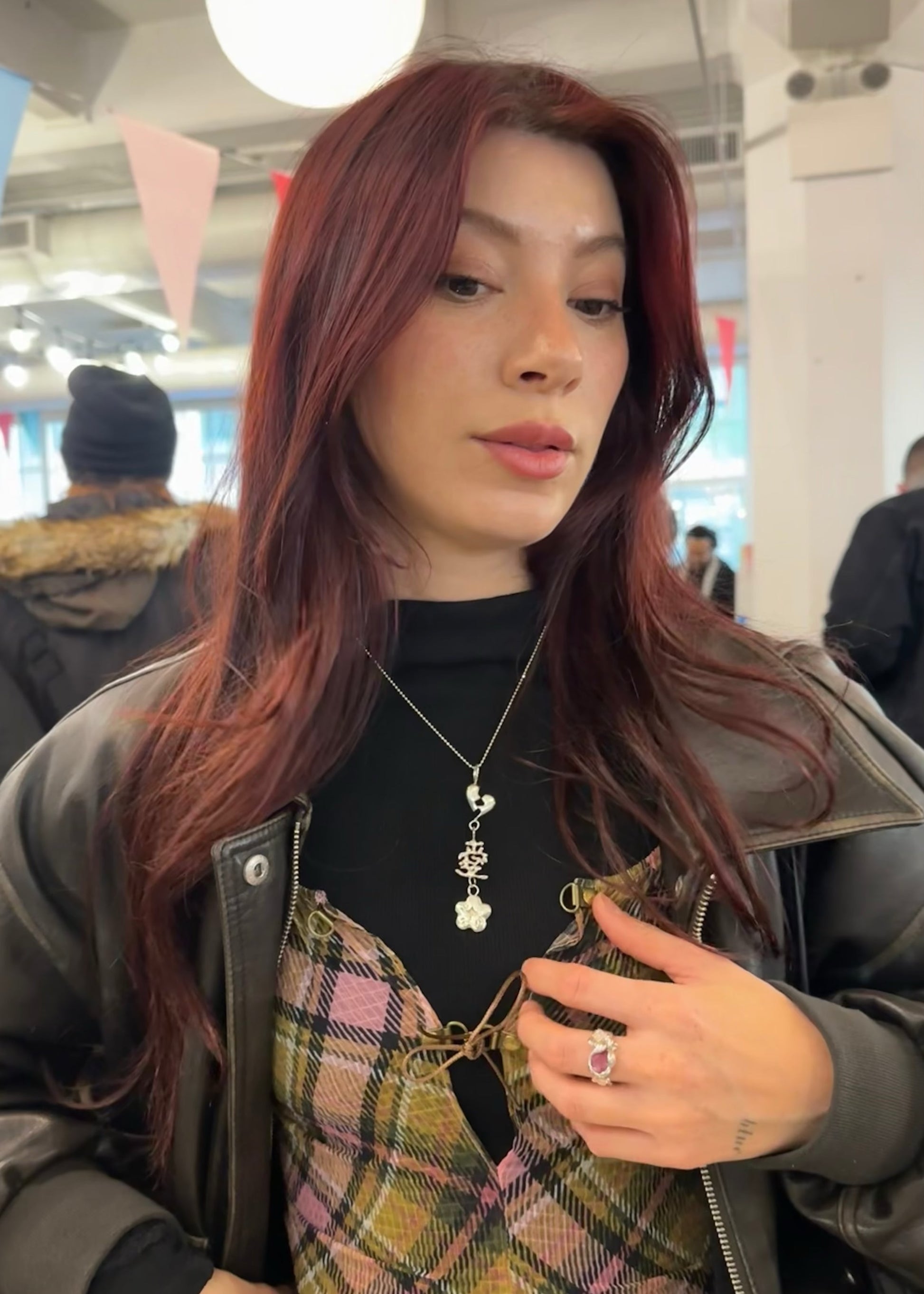 woman with red hair wearing heartbreak 愛 necklace, MAUM market