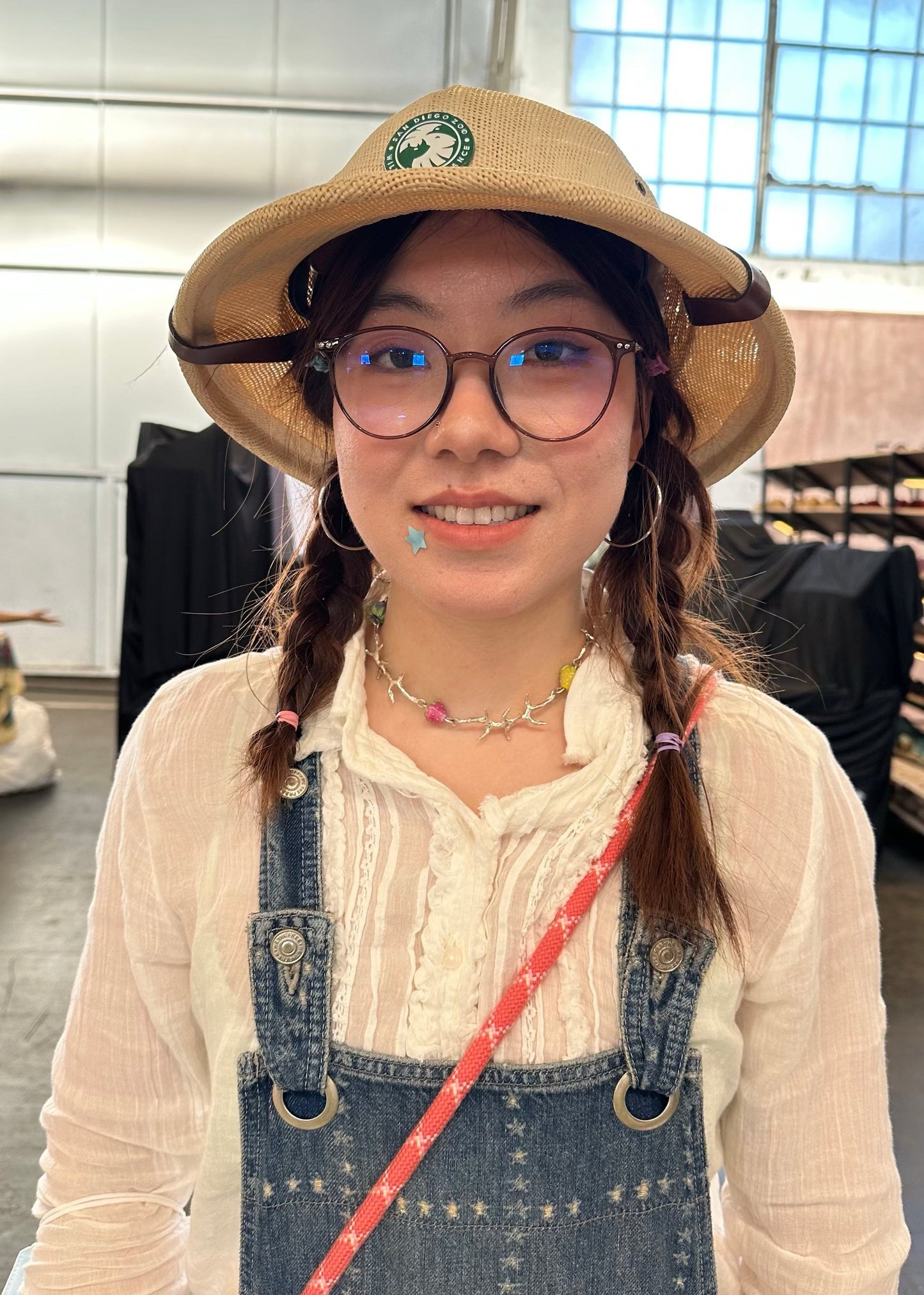 girl wearing pink and yellow choker at renegade san francisco