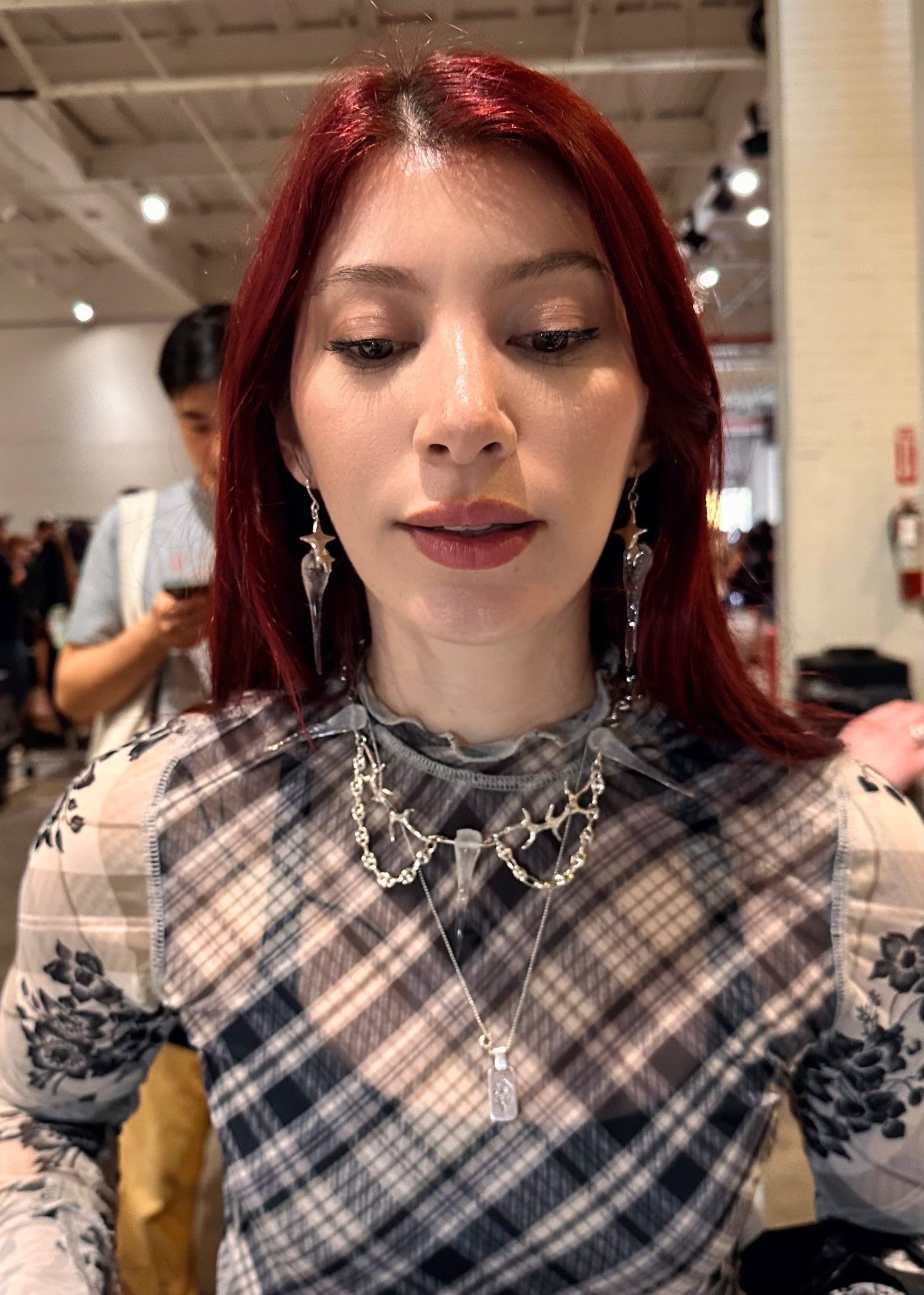 woman with red hair wearing icicle necklace and earrings, Brooklyn